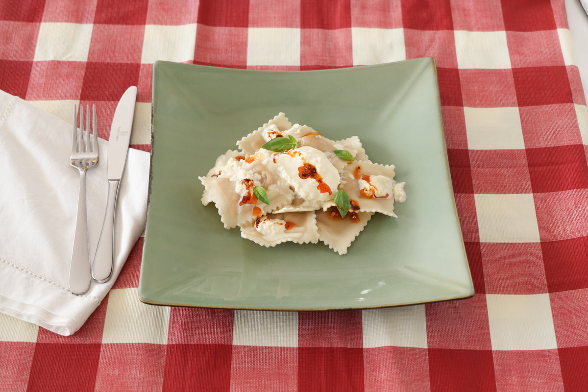 Pumpkin and Amaretti Ravioli with Chilli Oil and Stracciatella